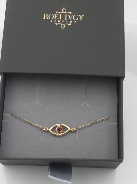 צמיד זהב עין עם אבן רובי טבעית