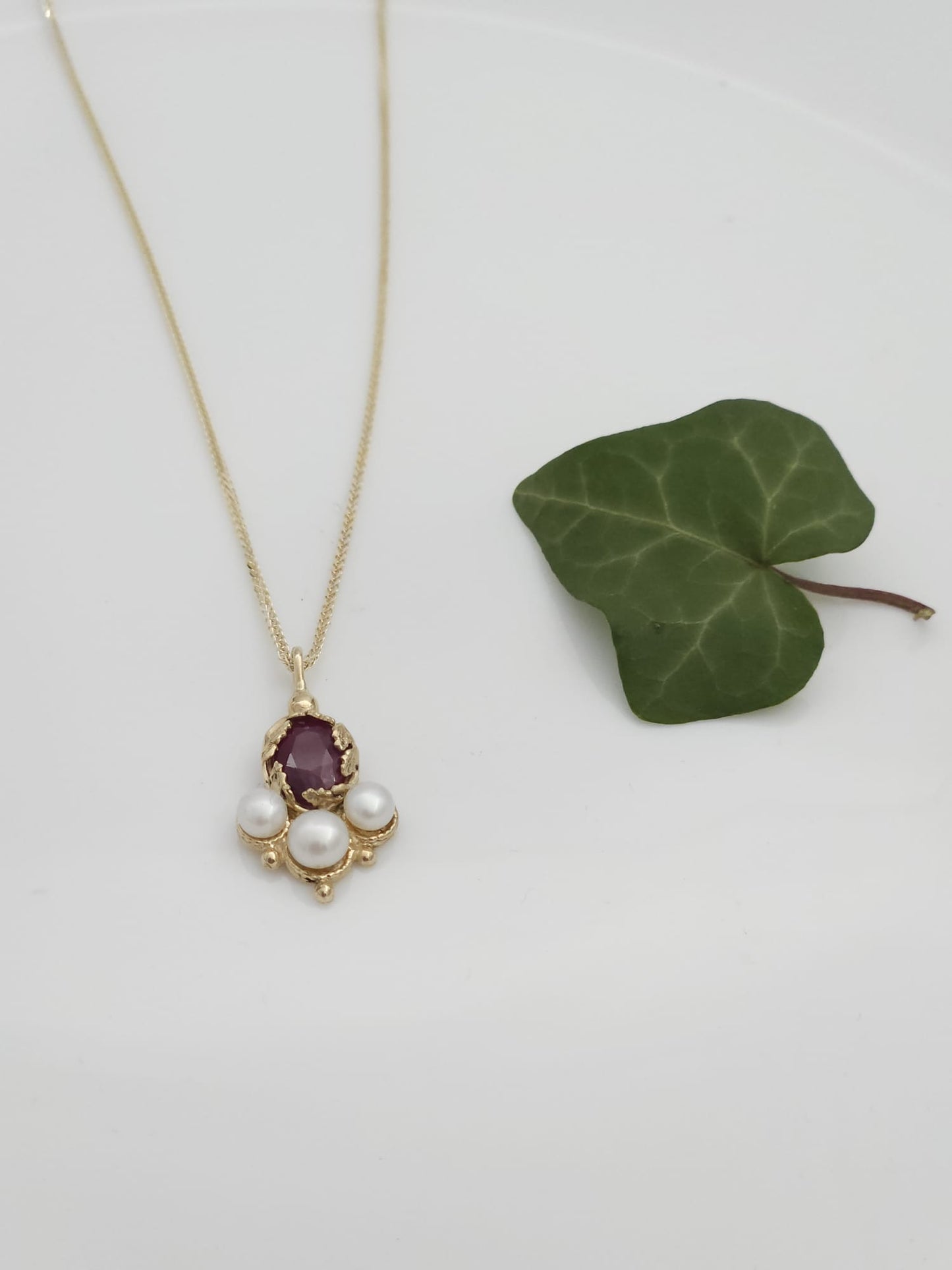 14K Gold Pendant and Necklace in an Antique Style, Adorned with Leaves, Set with a Natural Ruby and White Pearls