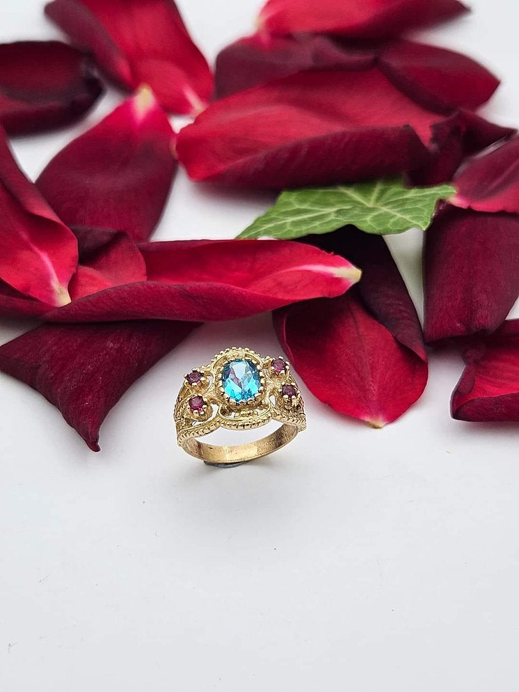 14K Gold Ring Set with Blue Topaz and Rubies