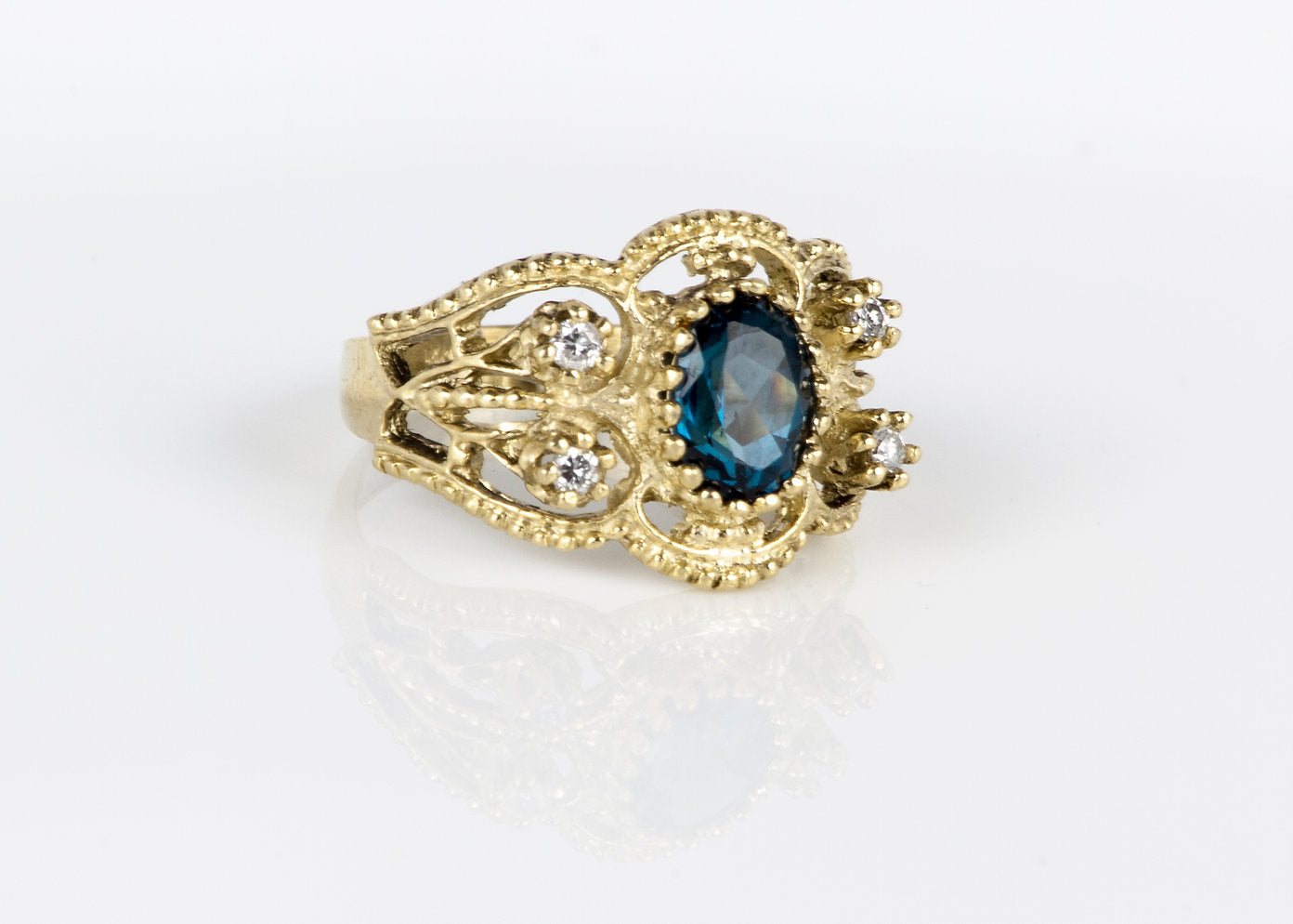 14K Gold Ring Set with London Topaz and 0.10ct White Diamonds