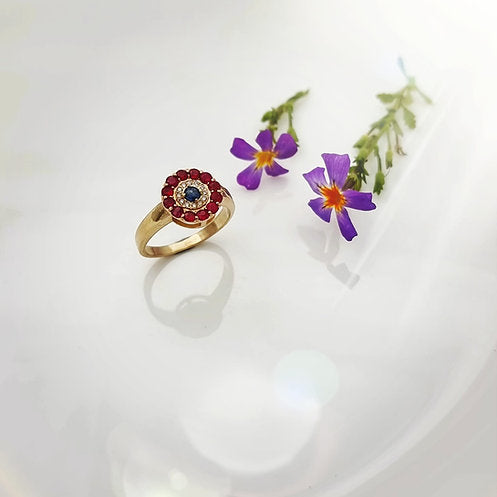 14K gold ring set with rubies, diamonds and sapphires