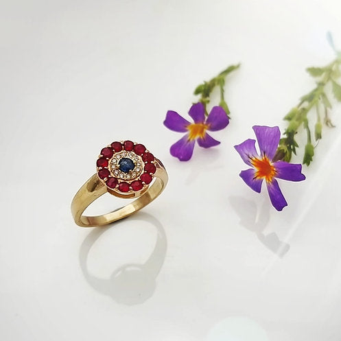14K gold ring set with rubies, diamonds and sapphires