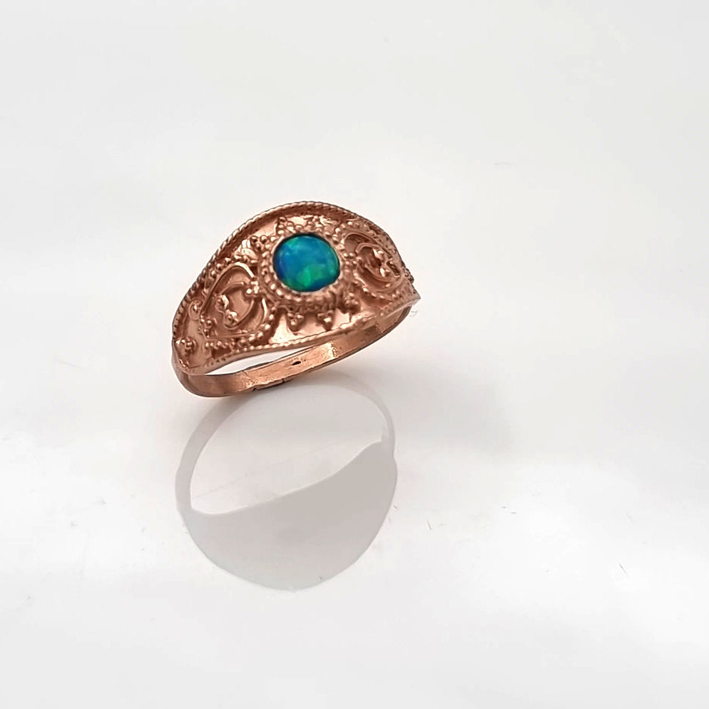 14K Gold Ring Set with an Oval Gemstone