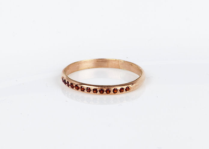 14K gold ring set with garnet stones