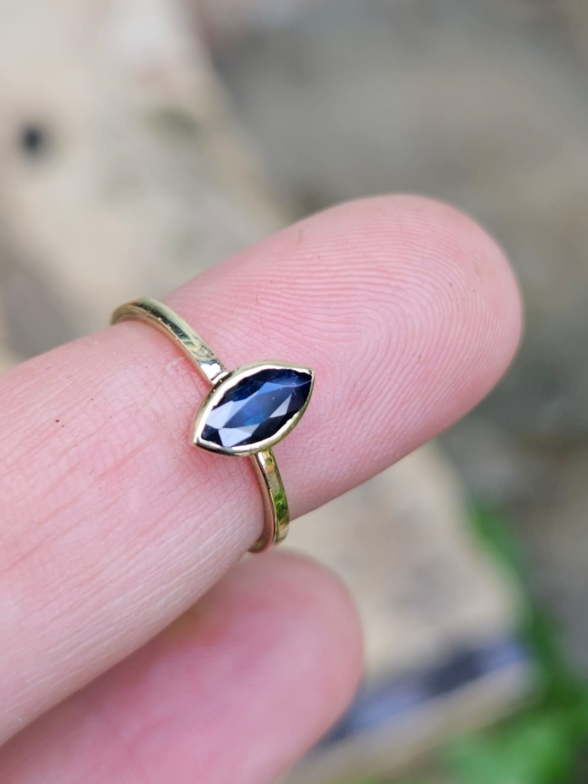 14K Gold Elegant Ring Set with a Marquise-Cut Sapphire