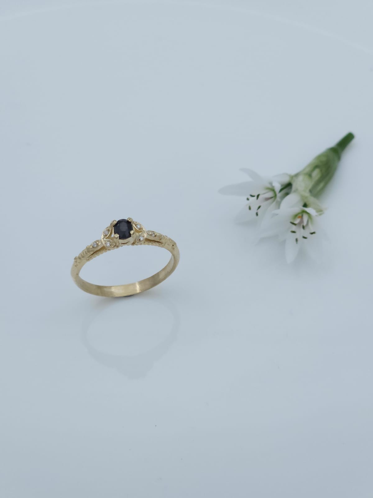 14K Gold Ring in Antique Style Set with Blue Sapphire and Side Diamonds