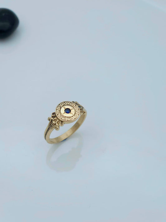 14K Gold Ring with Antique-Style Engravings, Set with a Blue Sapphire