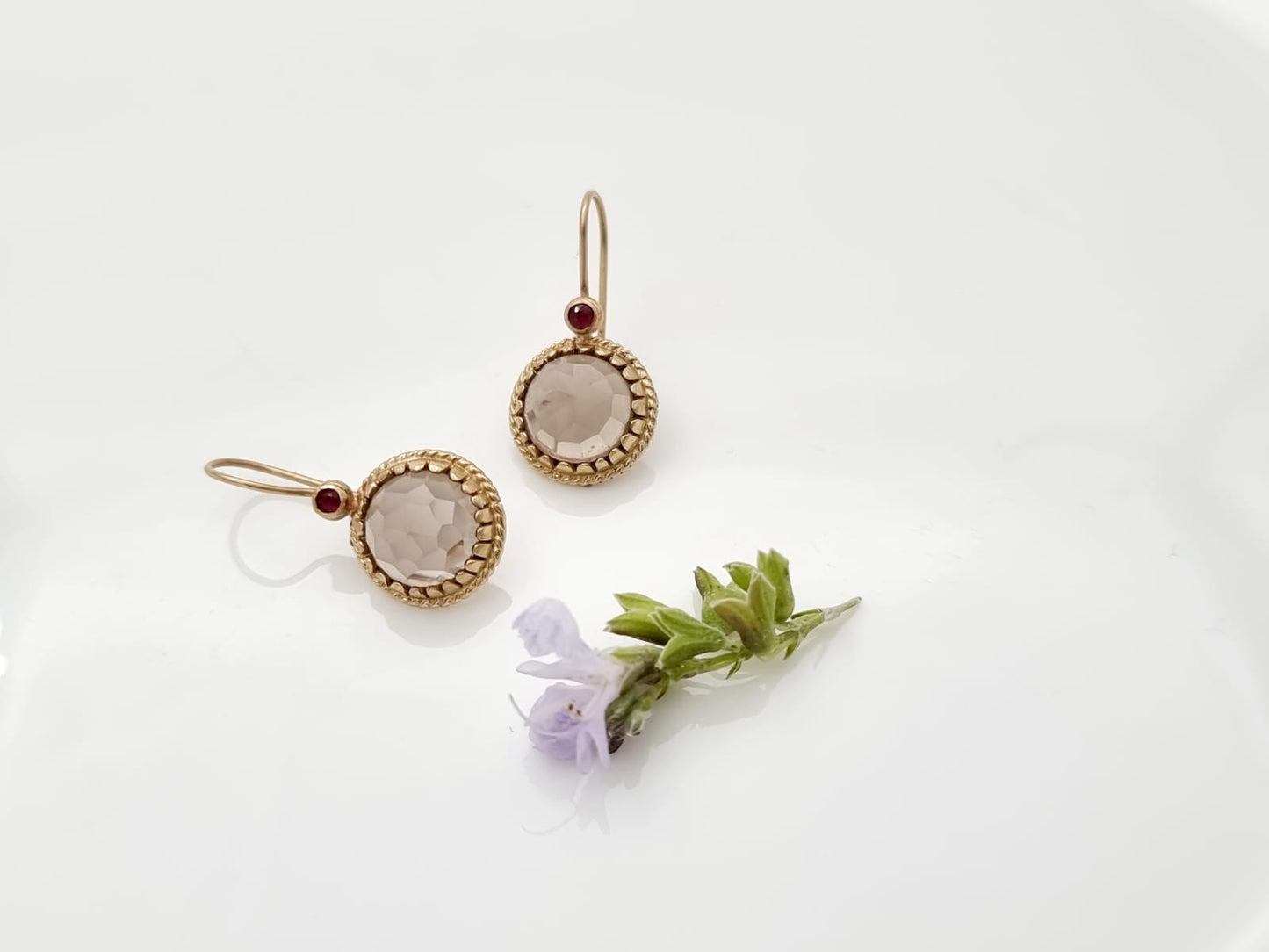 14K gold earrings set with smoky topaz and garnet