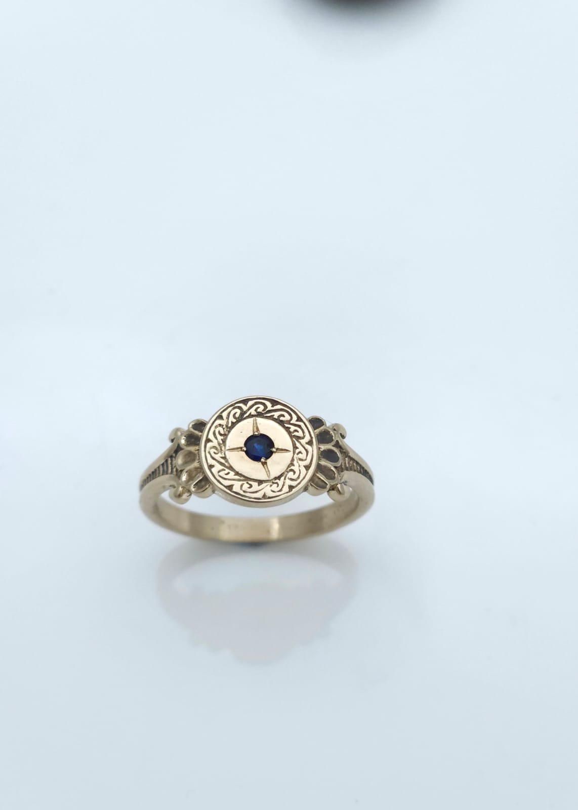 14K Gold Ring with Antique-Style Engravings, Set with a Blue Sapphire