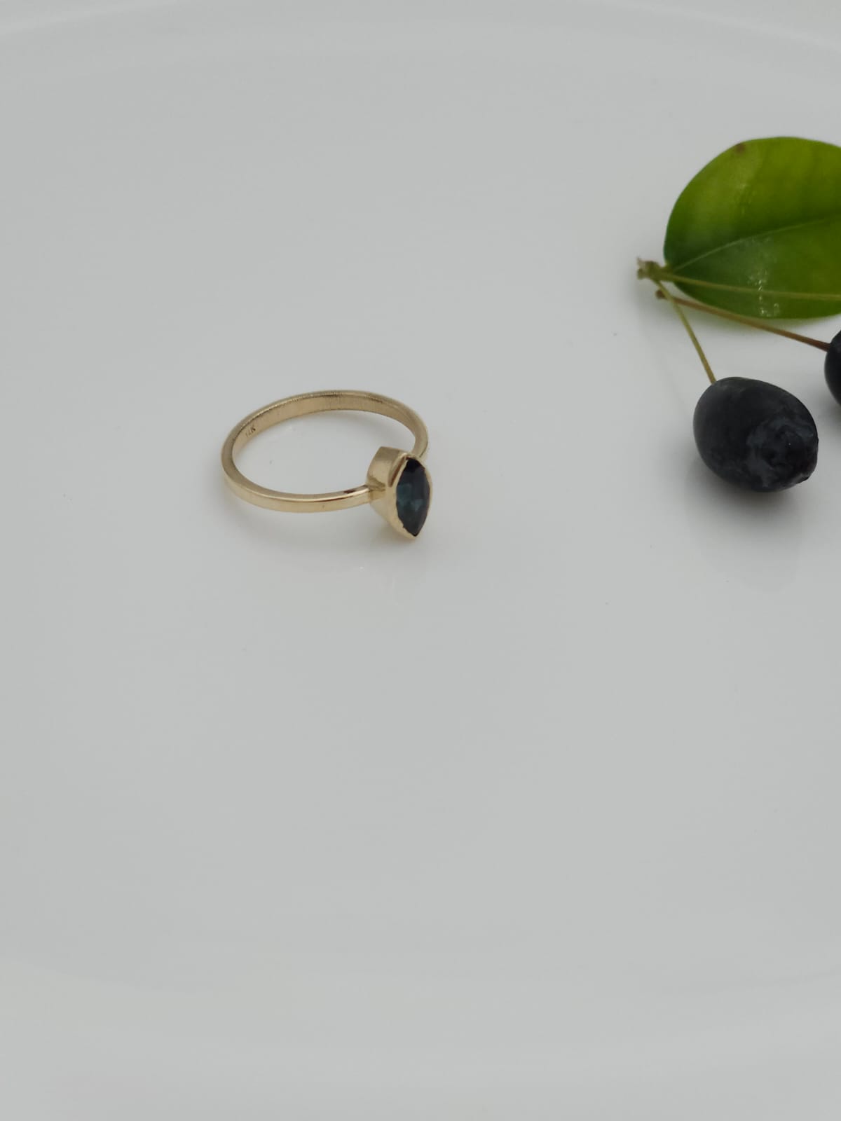 14K Gold Elegant Ring Set with a Marquise-Cut Sapphire