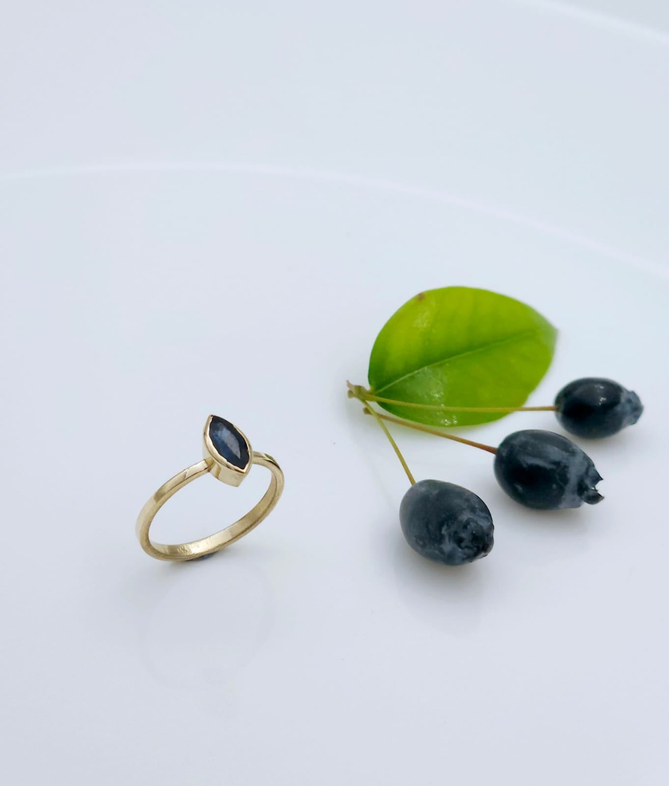 14K Gold Elegant Ring Set with a Marquise-Cut Sapphire