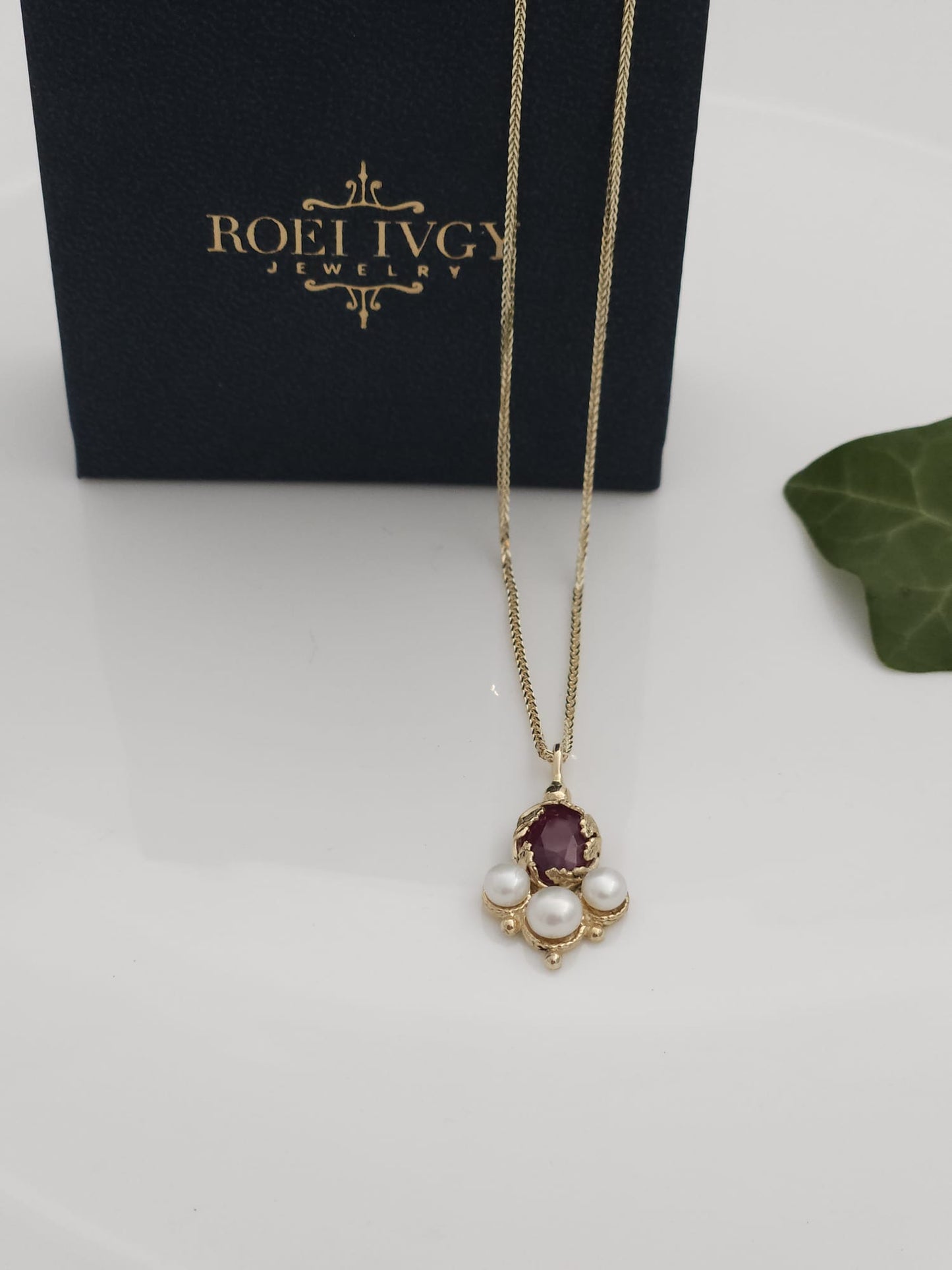 14K Gold Pendant and Necklace in an Antique Style, Adorned with Leaves, Set with a Natural Ruby and White Pearls