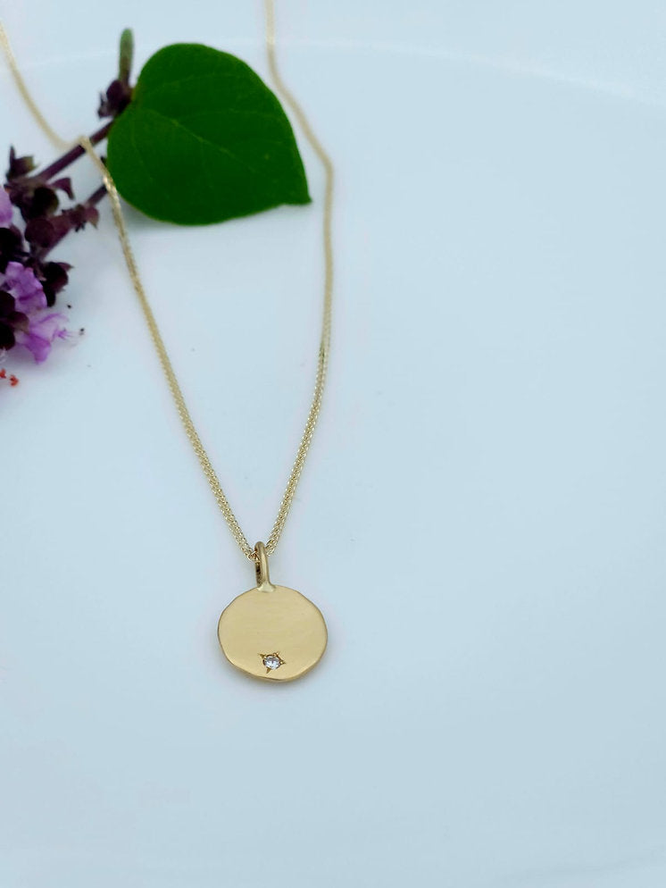 Matte 14K Gold Pendant Set with a Diamond