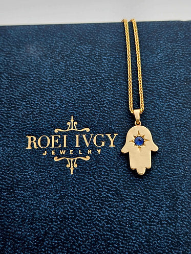 Gold Hamsa Pendant with Blue Sapphire