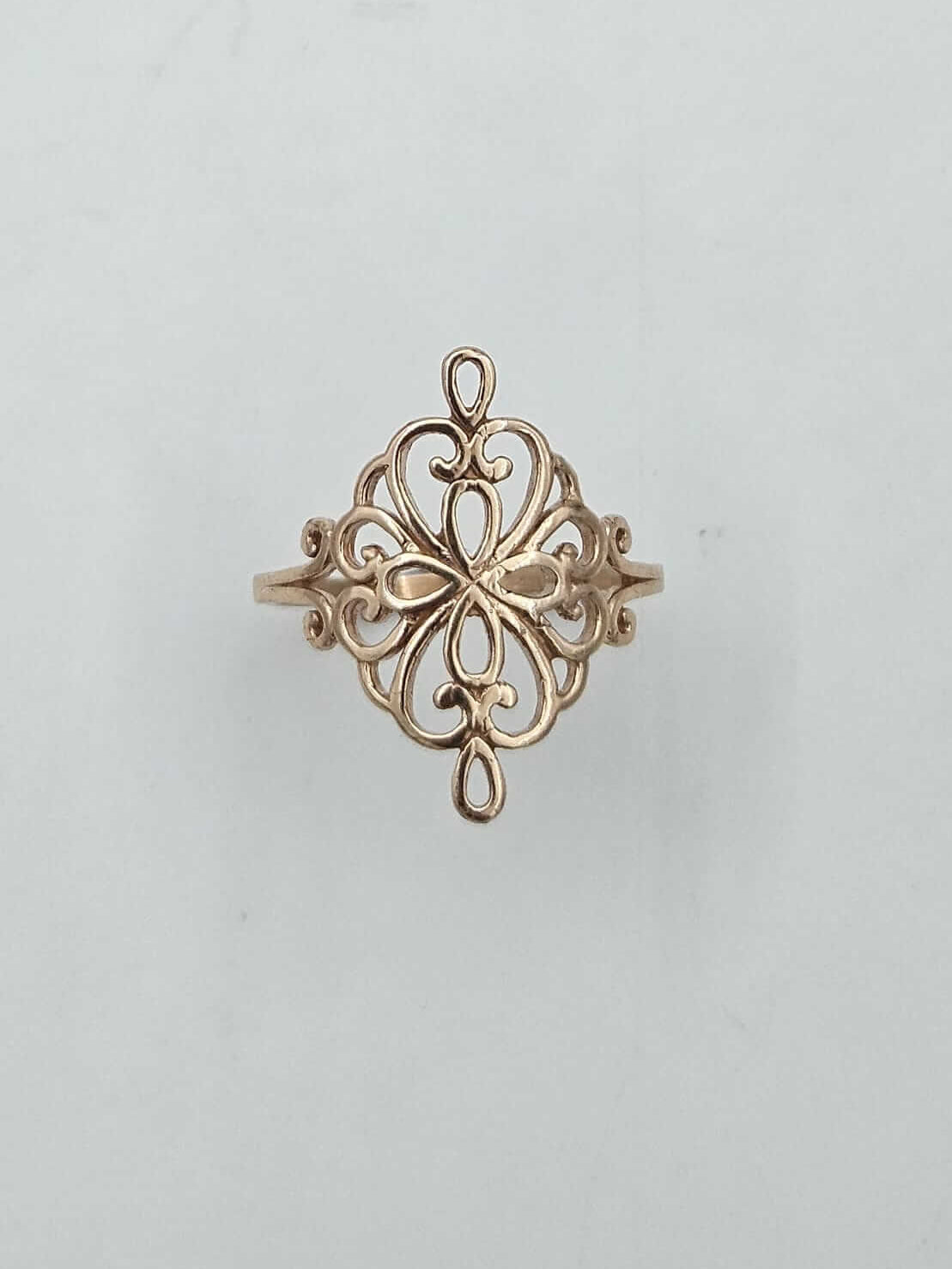 14K gold ring adorned with filigree