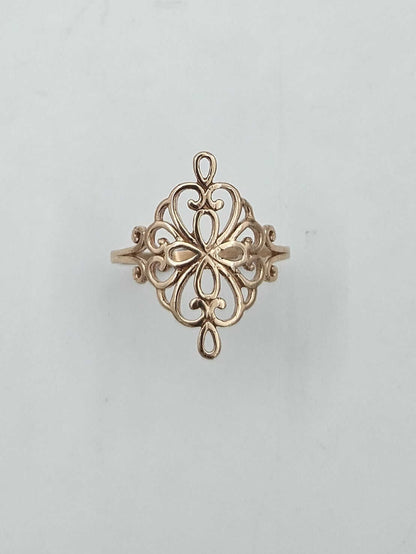 14K gold ring adorned with filigree