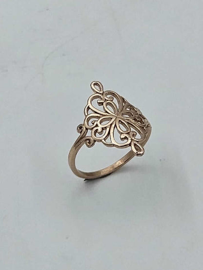 14K gold ring adorned with filigree