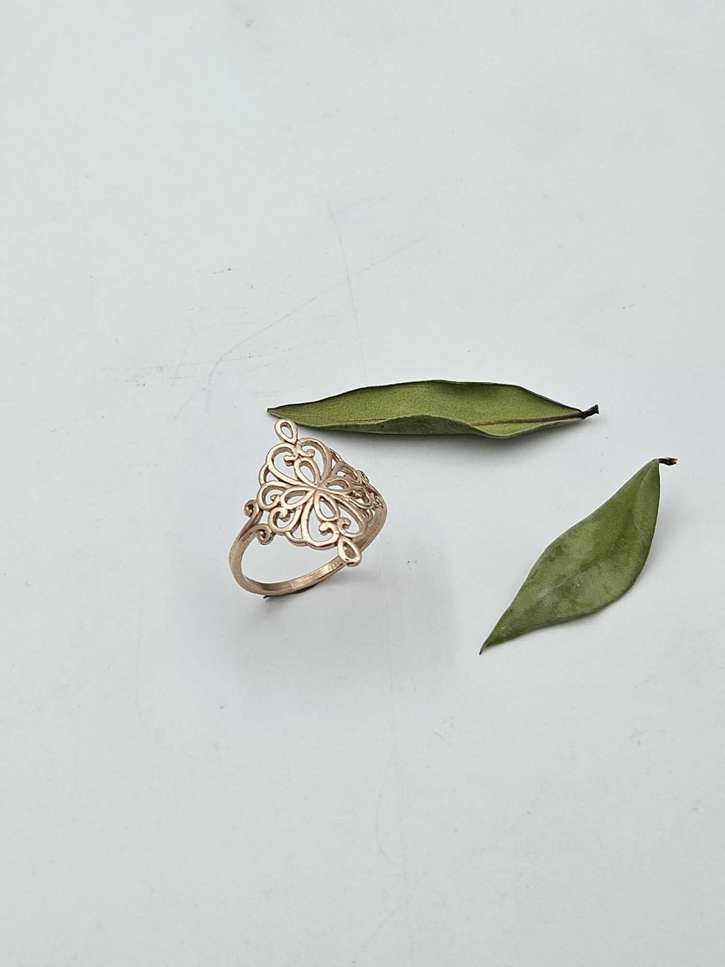 14K gold ring adorned with filigree
