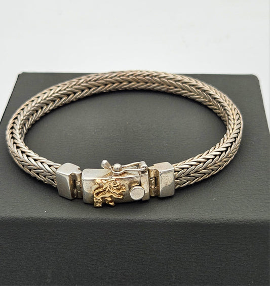 Impressive silver bracelet with 14k gold lion